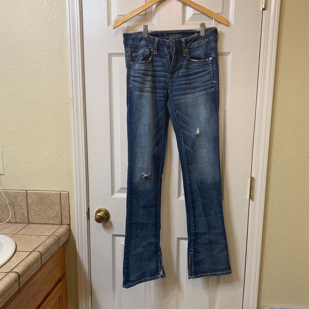 AE skinny kick boot jeans with bottom slit detail